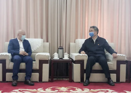 中国系统总裁陈士刚与河南省委秘书长穆为民会晤